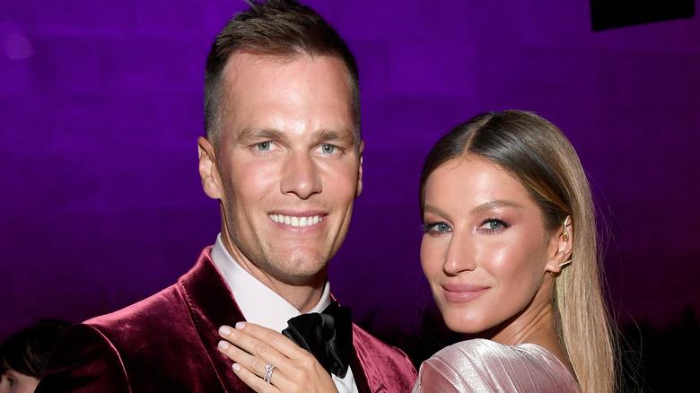 Tom Brady smiling with Gisele Bündchen