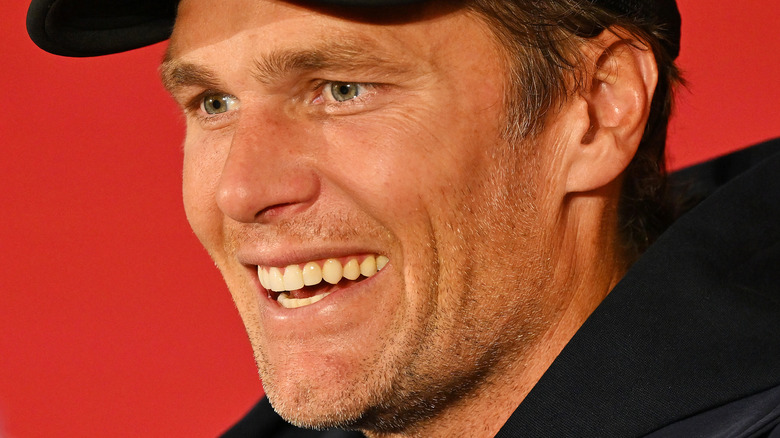 Tom Brady grining