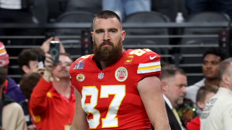Travis Kelce looking serious on football field