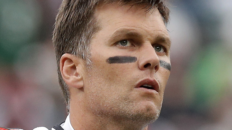 Tom Brady playing against the New Jersey Jets at Metlife Stadium