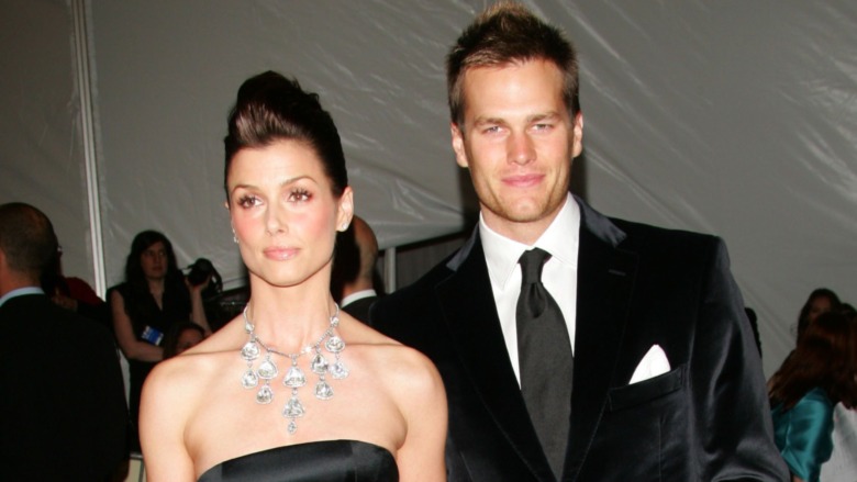 Bridget Moynahan and Tom Brady posing for cameras on red carpet together