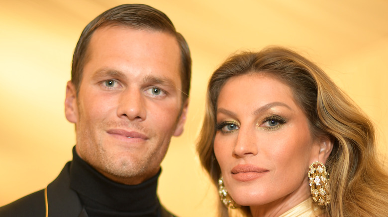 Tom Brady posing with Gisele Bundchen