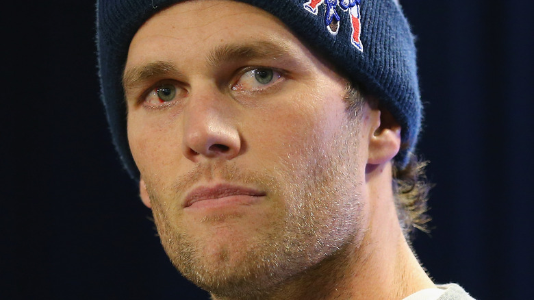Tom Brady at a press conference 