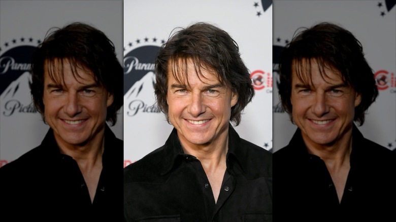 Tom Cruise smiling with teeth