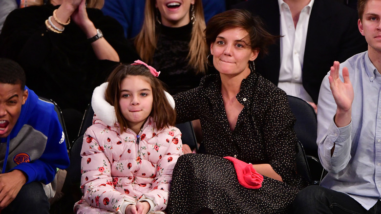 Suri Cruise and Katie Holmes courtside