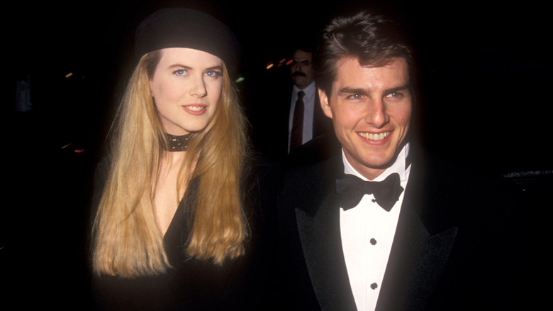 Nicole Kidman and Tom Cruise walk together in 1993