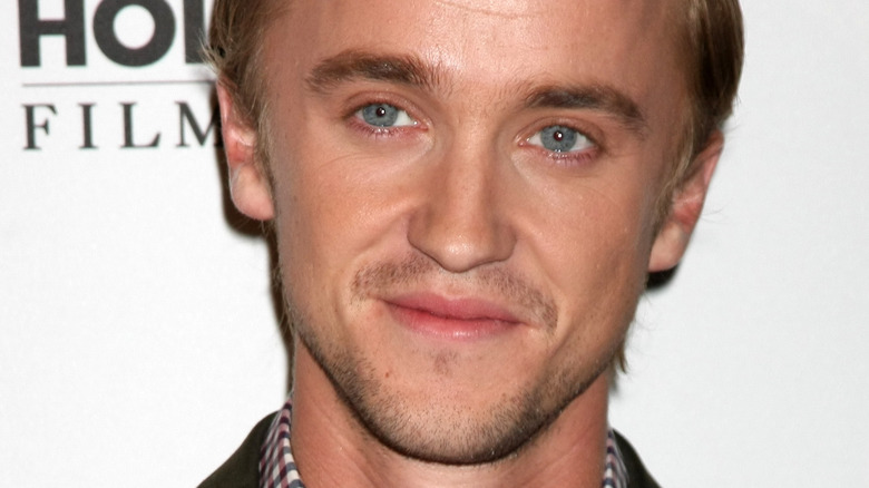 Tom Felton smiling 