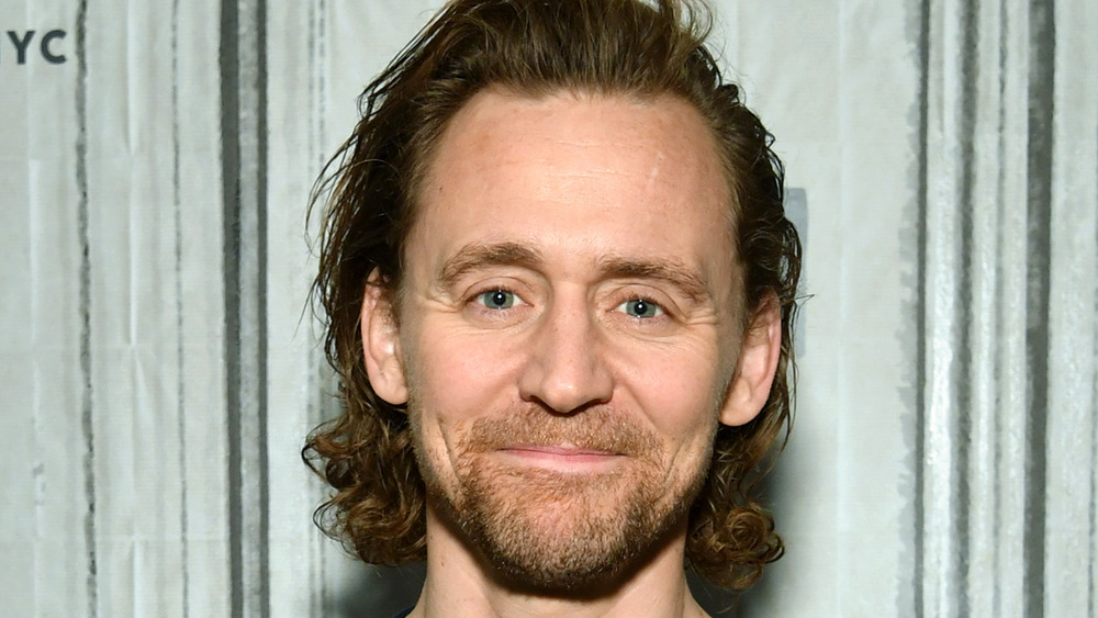 Tom Hiddleston smiling