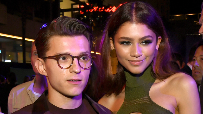 Tom Holland and Zendaya posing