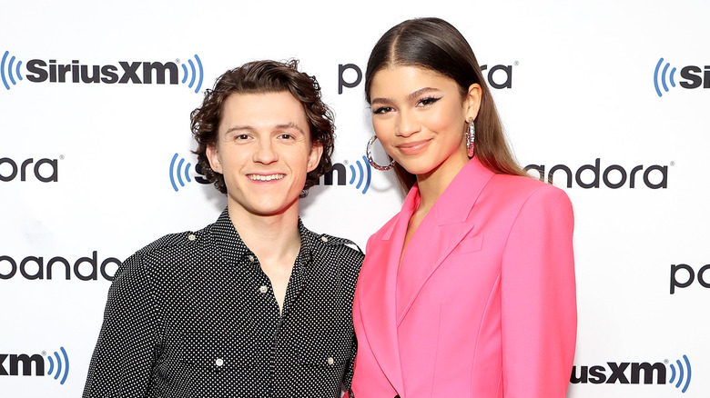 Tom Holland and Zendaya smiling