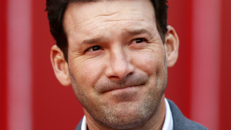 Tony Romo red background