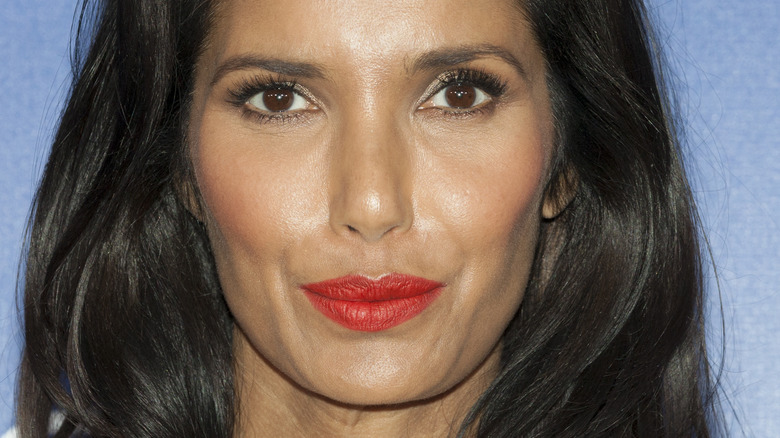 Padma Lakshmi smiles on red carpet