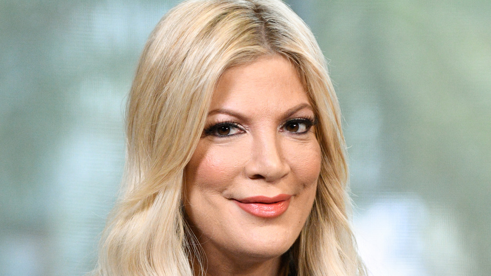 Tori Spelling smiling