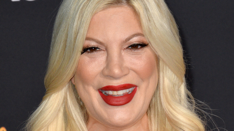 Tori Spelling smiling