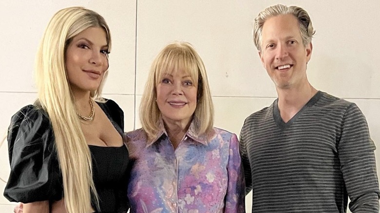 Tori, Candy, and Randy Spelling pose for a photo