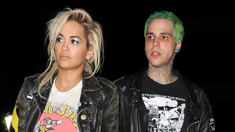 Rita Ora and Richard Hilfiger walking together