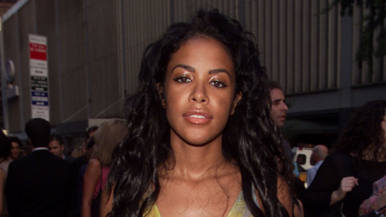 Aaliyah with a neutral expression