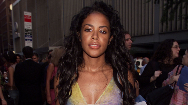 Aaliyah with a neutral expression