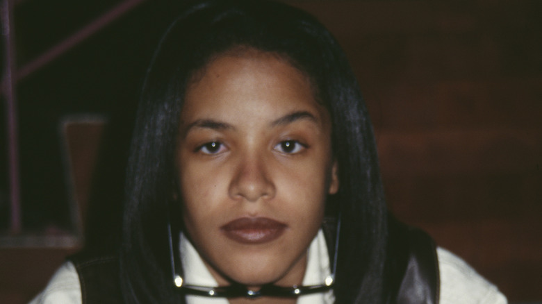 Aaliyah with a neutral expression