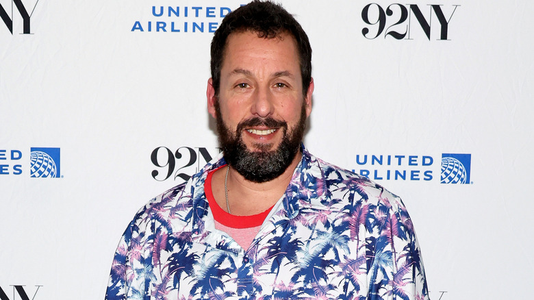 Adam Sandler, smiling