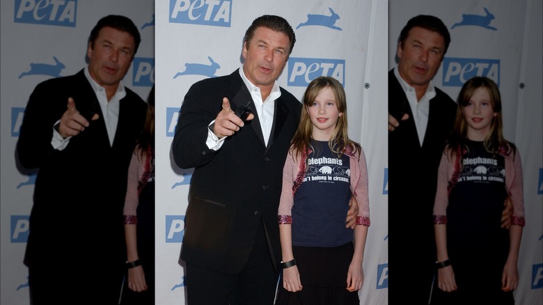 Alec and Ireland Baldwin posing