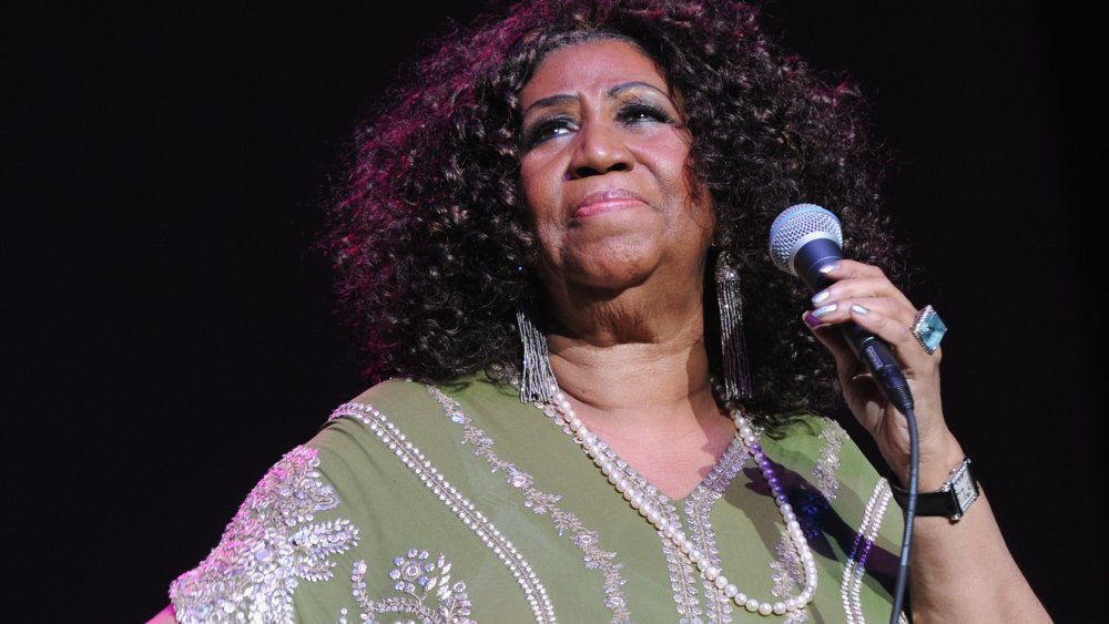 Aretha Franklin performing on stage