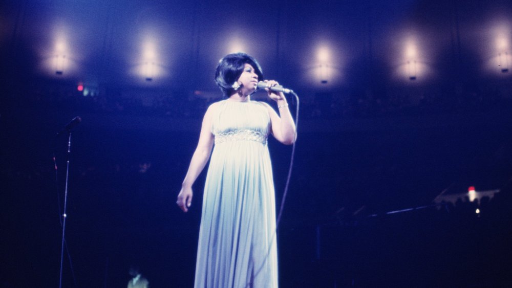 Aretha Franklin performing on stage