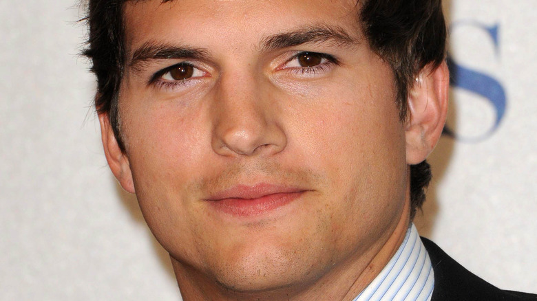 Ashton Kutcher looking at camera