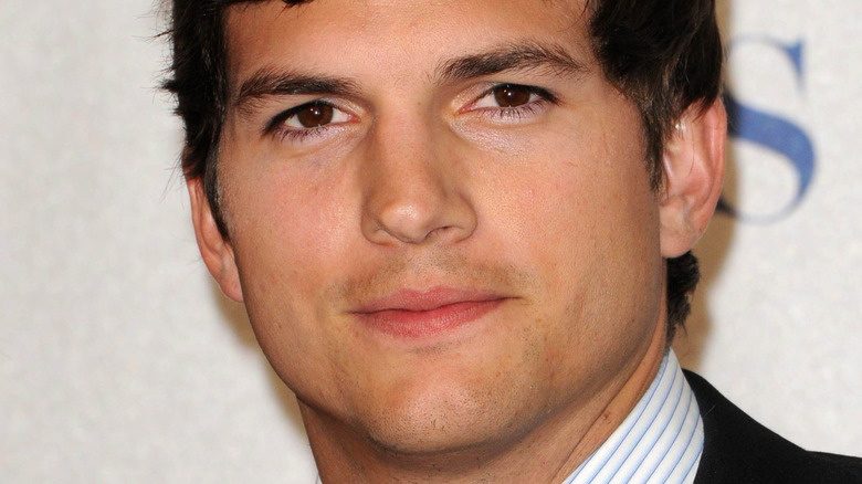 Ashton Kutcher looking at camera