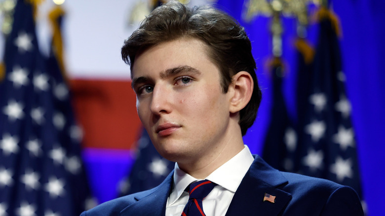 Barron Trump looking to the side
