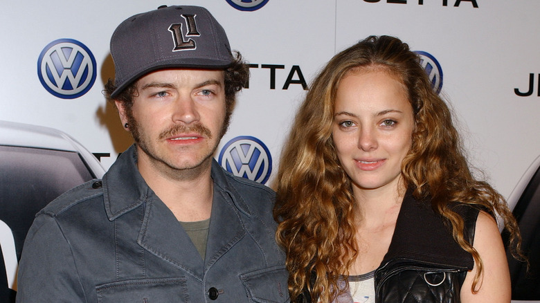 Danny Masterson frowning, Bijou Phillips smiling