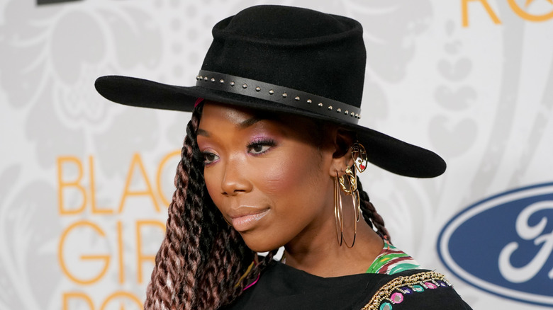 Brandy posing in a big hat