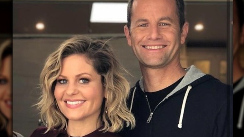 Candace Cameron Bure and Kirk Cameron posing together