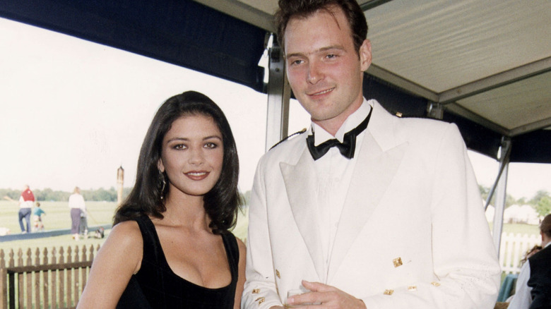 Catherine Zeta-Jones and John Leslie smiling