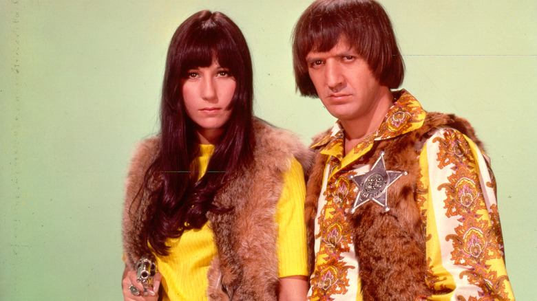 Cher and Sonny Bono, posing