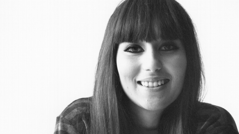 Young Cher smiling
