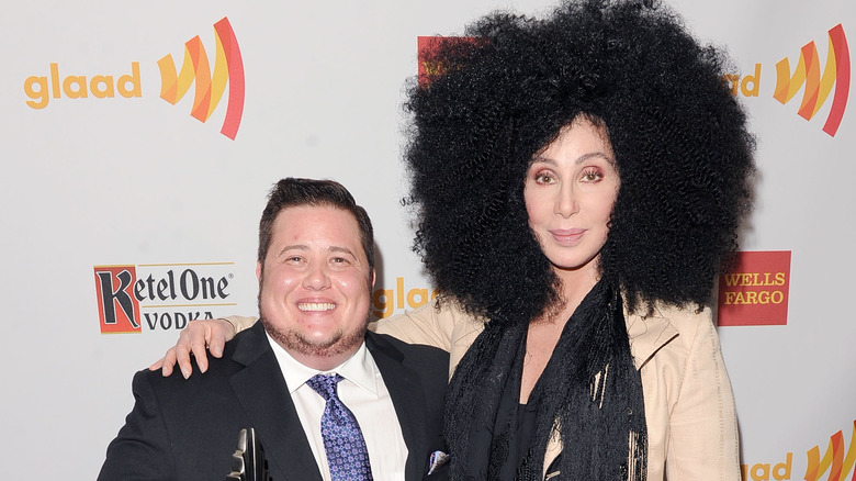 Cher and Chaz Bono, posing