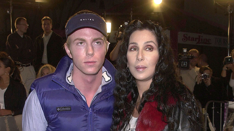 Cher and Elijah both posing