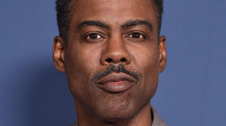 Chris Rock posing