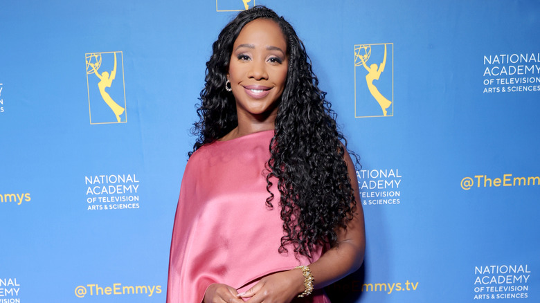Abby Phillip posing on the red carpet at the 2025 News Emmy Awards.