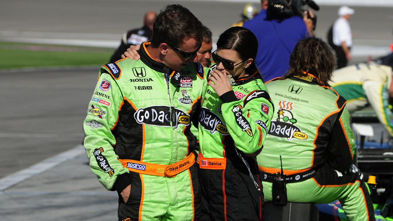 Danica Patrick is consoled at the Indy300