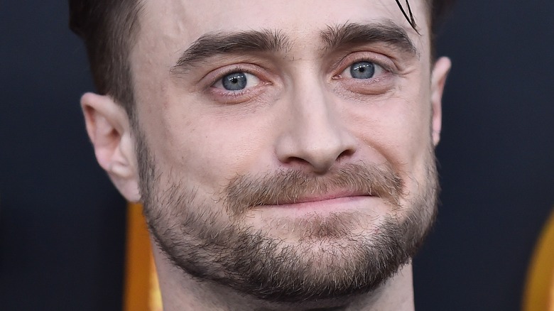 Daniel Radcliffe smiling uncomfortably 