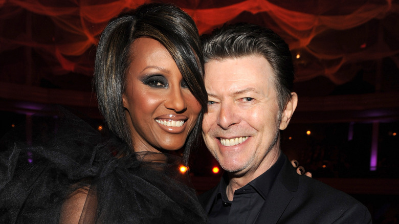 David Bowie and Iman hug in 2009