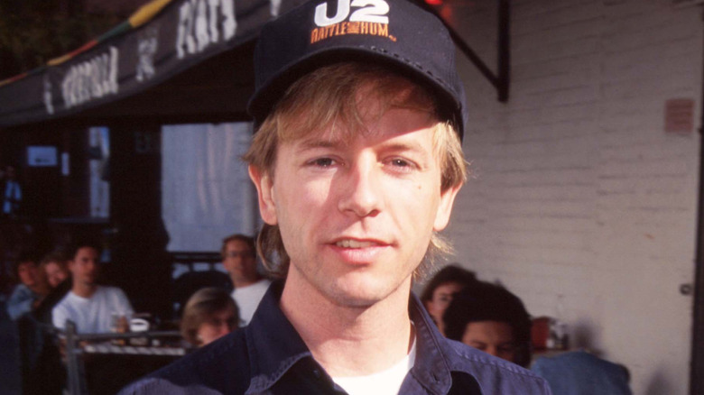 David Spade young in baseball cap