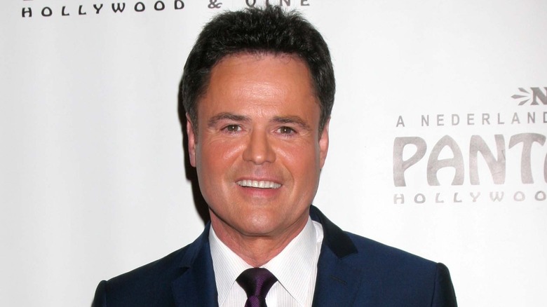 Donny Osmond posing for cameras