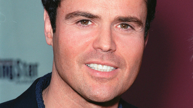 Donny Osmond posing for cameras