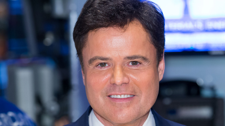 Donny Osmond posing for cameras