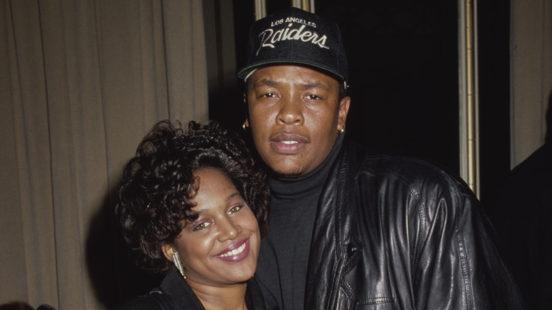 Michel'le and Dr Dre posing