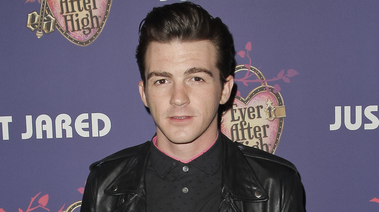 Drake Bell looking at camera