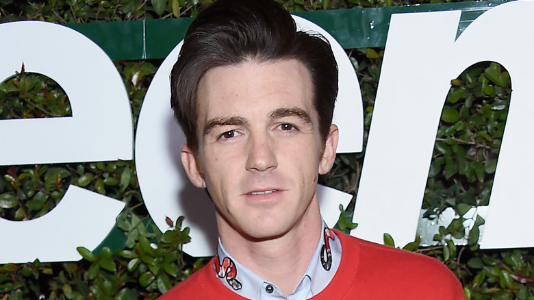 Drake Bell looking at camera